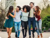 Group of students walking and laughing, symbolising student life and community. This image supports our focus on student  rooms for rent.