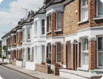 Row of houses lined up, representing available rooms for rent. This image highlights various housing options and appeals to those seeking rental accommodations.